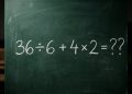 Quadro verde com a expressão matemática 36 ÷ 6 + 4 × 2 escrita em giz branco.